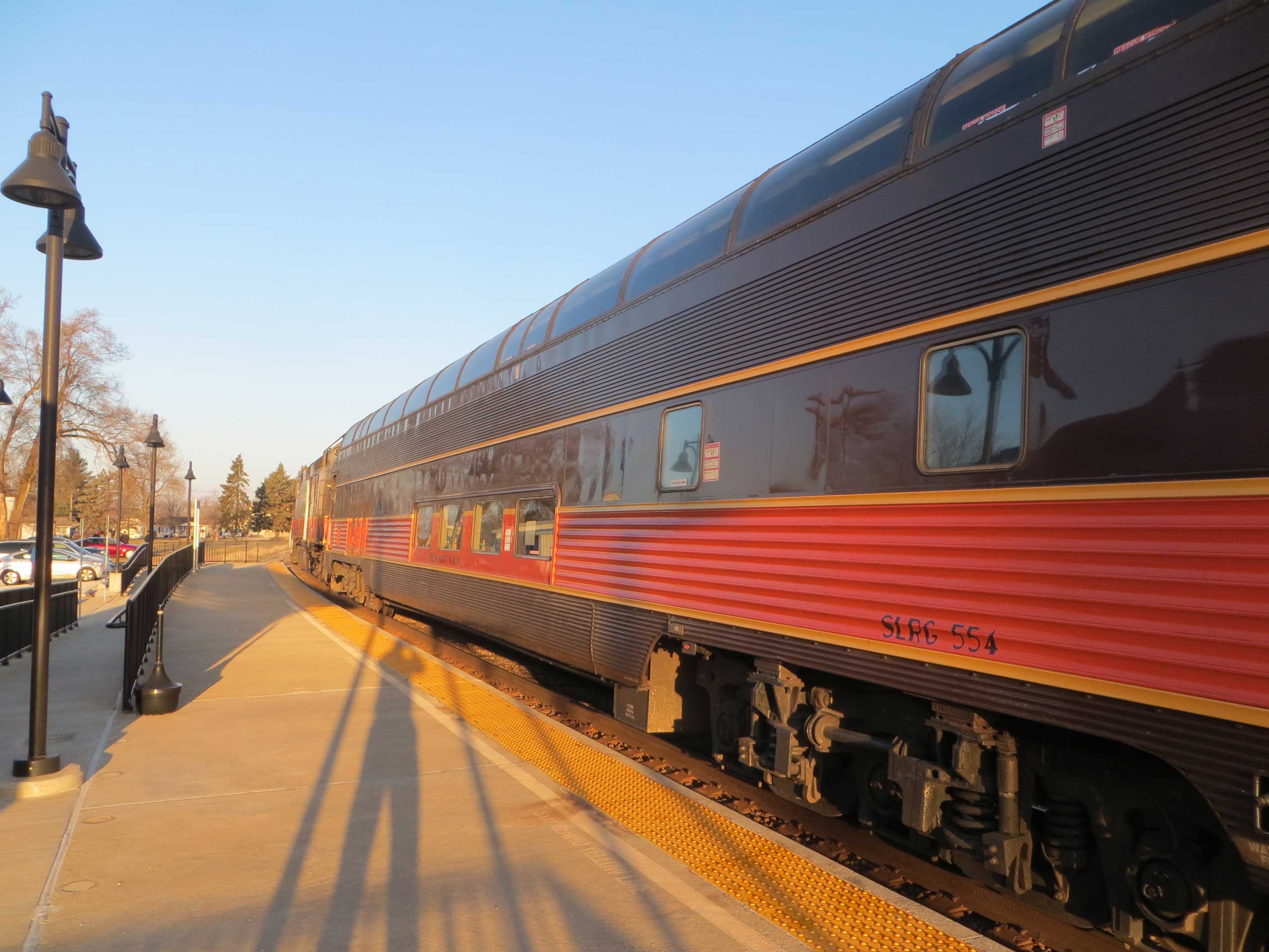 Iowa Pacific coaches on the Hoosier State. Photo by David Wilson from Oak Park, Illinois, USA (20170205 13 Hoosier State @ Rensselaer, Indiana) CC BY 2.0 via Wikimedia Commons