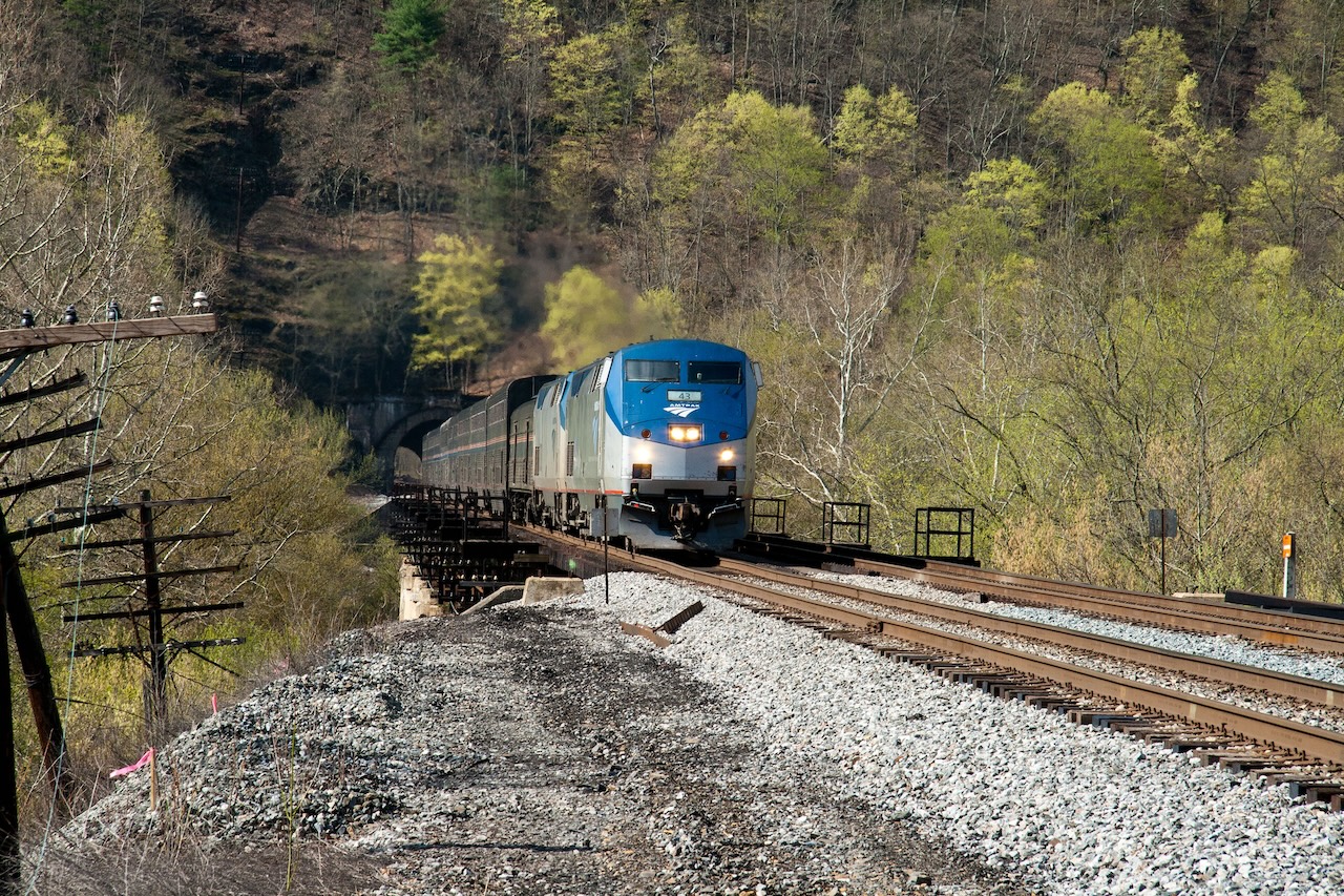  The Capitol Limited exits Graham Tunnel and crosses the Potomac River in Magnolia, West Virginia, in 2011. Photograph by John Mueller, CC BY 2.0.