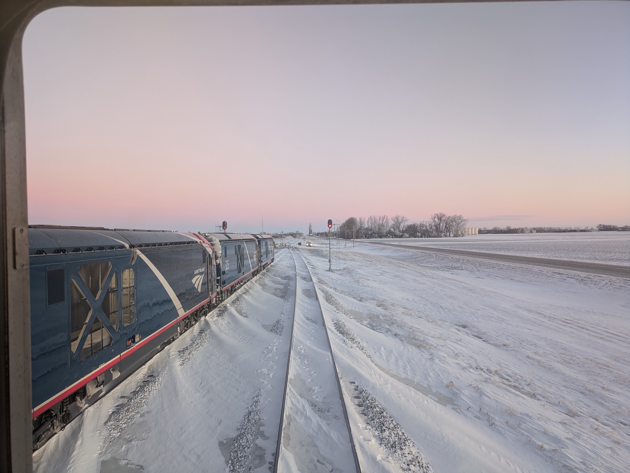 Two trains waiting on a frozen switch